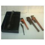 Three Pipe Wrenches in Hand Tote