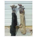 Black and Off White Bags of Golf Clubs
