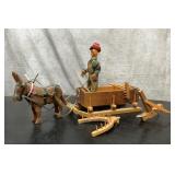Hand carved farmer with his mule & tools