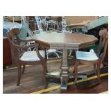 Octagonal table with two chairs pedestal base 38