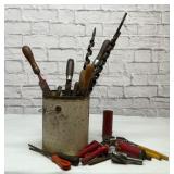 Bucket full of antique hand tools