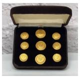 9 CADILAC GOLD PLATED BUTTONS IN VELVET CASE