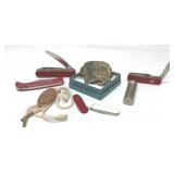 Indian belt buckle, bolo tie, pocket knives, Boy