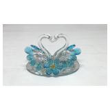 Crystal swans blue feathers