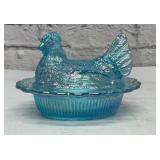 Aqua blue hen on a nest 6