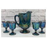 Antique carnival glass pitcher & glasses