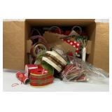Box of gift bags and ribbon