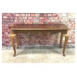 Sofa table with queen and legs and shell appliquï¿½.