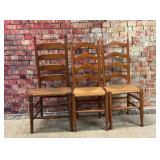 3 Rush seat ladder back chairs