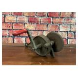 Hand crank bench grinder