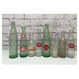 8 old soda bottles