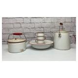 Red enamelware tea kettles, cup, bowl