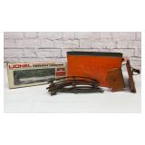 Lionel freight carrier and train track