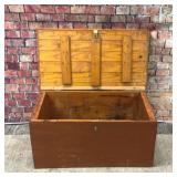 Vintage trunk loaded with vintage bottles