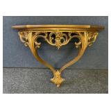 Glam gold wall table