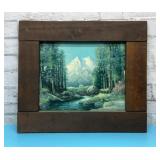 Framed mountain stream artwork