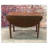 Cherry drop leaf oval table