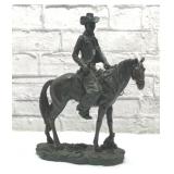 Western cowboy on a horse statue