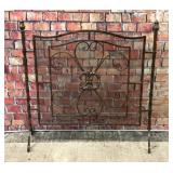 Metal fireplace screen bronze colored