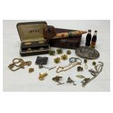 Assorted tiepins, chains, belt buckle, pipe