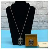 2 international pewter, tiki head pendants