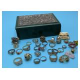 Small jewelry box full of rings