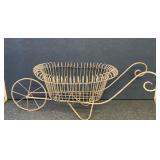 Wrought iron wheelbarrow garden flower cart