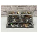 Costume jewelry earrings in lucite box