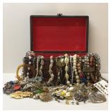 Costume jewelry with carved wood box