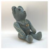 Wrangler jeans, stuffed teddy bear