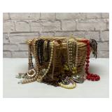 Large basket of assorted costume, jewelry