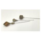 3 antique hat pins 4