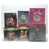6 musical snow, globes, and music boxes
