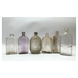 6 antique flask bottles 9
