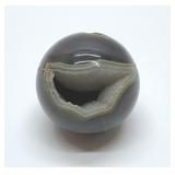 Polished aspheric with natural crystal geode