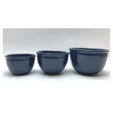 Set of three blue mixing bowls