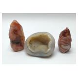 Quartz crystal geode,  orange Carnelian towers