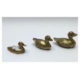 3 small brass ducks 3