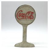 Coca-Cola cast-iron doorstop