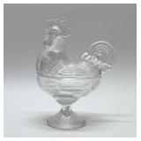 LE Smith, hen on a nest rooster