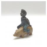 BLACK AMERICANA BOY ON PIG CAST IRON BANK