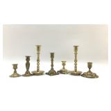 Seven brass candlesticks