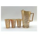 Jeanette Carnival glass pitcher, glasses