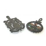 2 DECORATIVE DUTCH CAST IRON TRIVETS