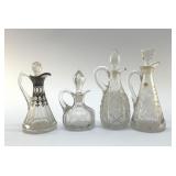 4 ANTIQUE CRUETS WITH STOPPERS