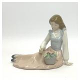 NADAL PORCELAIN WOMAN WITH FLOWERS FIGURINE