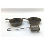 2 MINI CAST-IRON, SKILLETS AND STRAINER