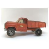 1960S PUNK UP ORANGE PRESSED STEEL DUMP TRUCK