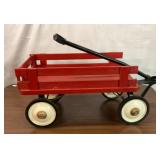 Vintage red wagon with wood rails
