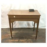 Vintage sewing table with sewing machine